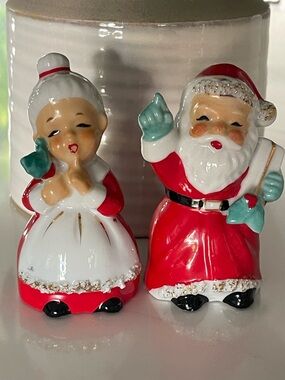 vintage ceramic salt and pepper shakers featuring Mr. and Mrs. Claus